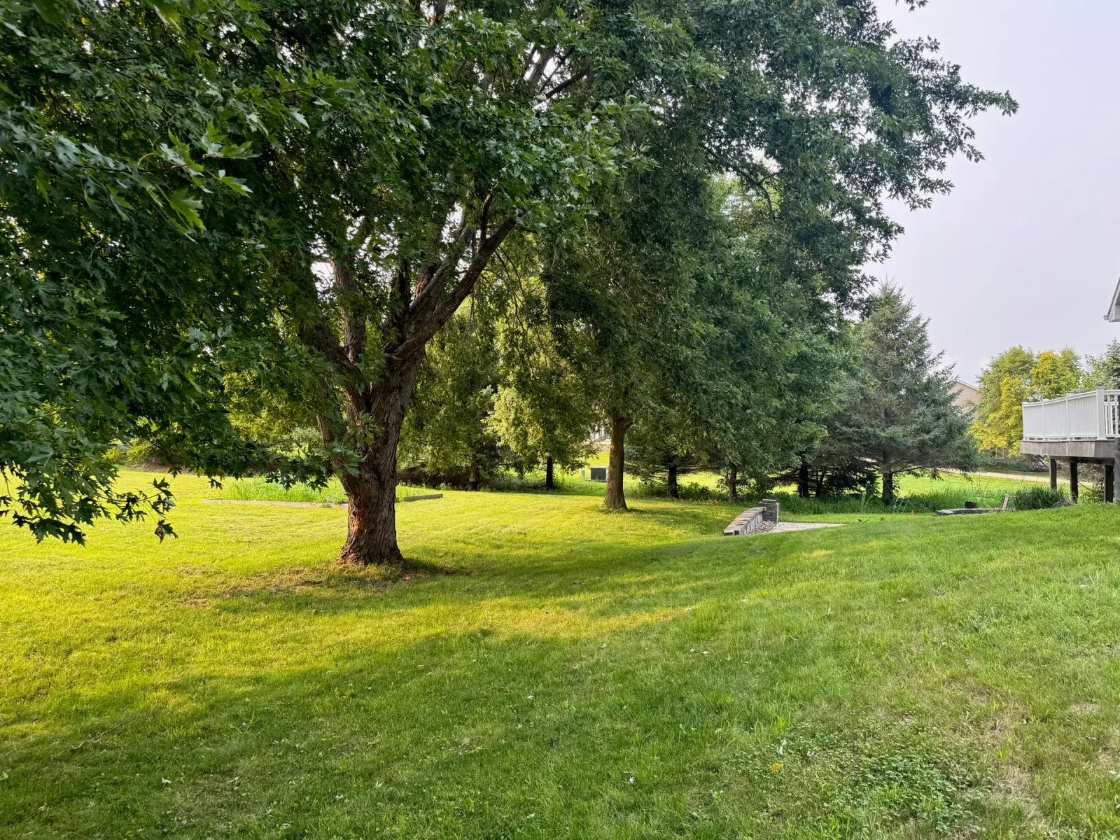 10908 NW 107th Street, Granger, Iowa - Open Lawn At Dusk