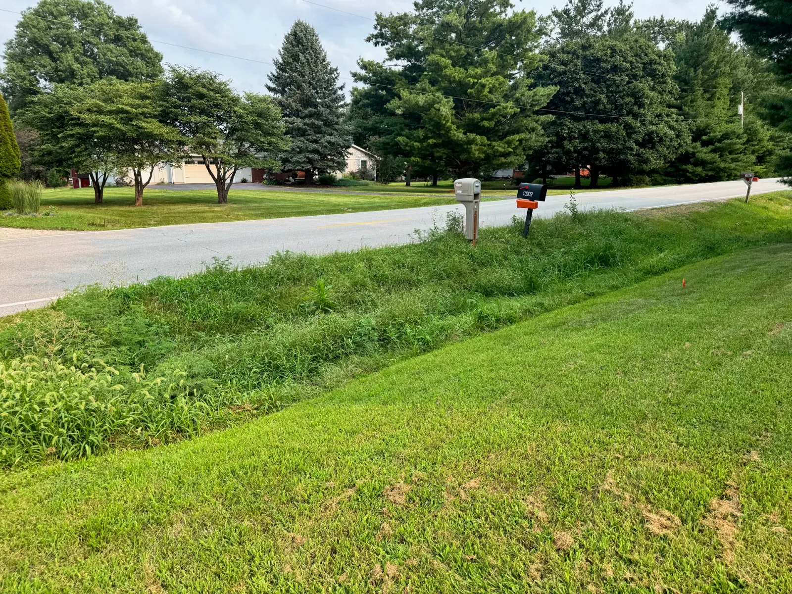 10908 NW 107th Street, Granger, Iowa - Road Frontage And Mailboxes