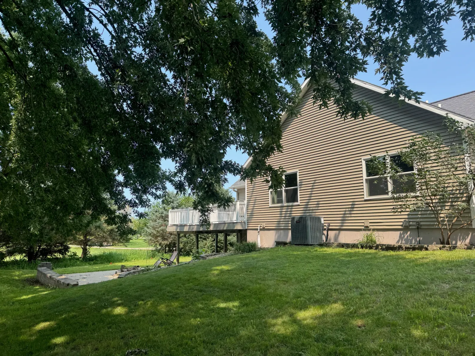 10908 NW 107th Street, Granger, Iowa - Side Elevation And Deck