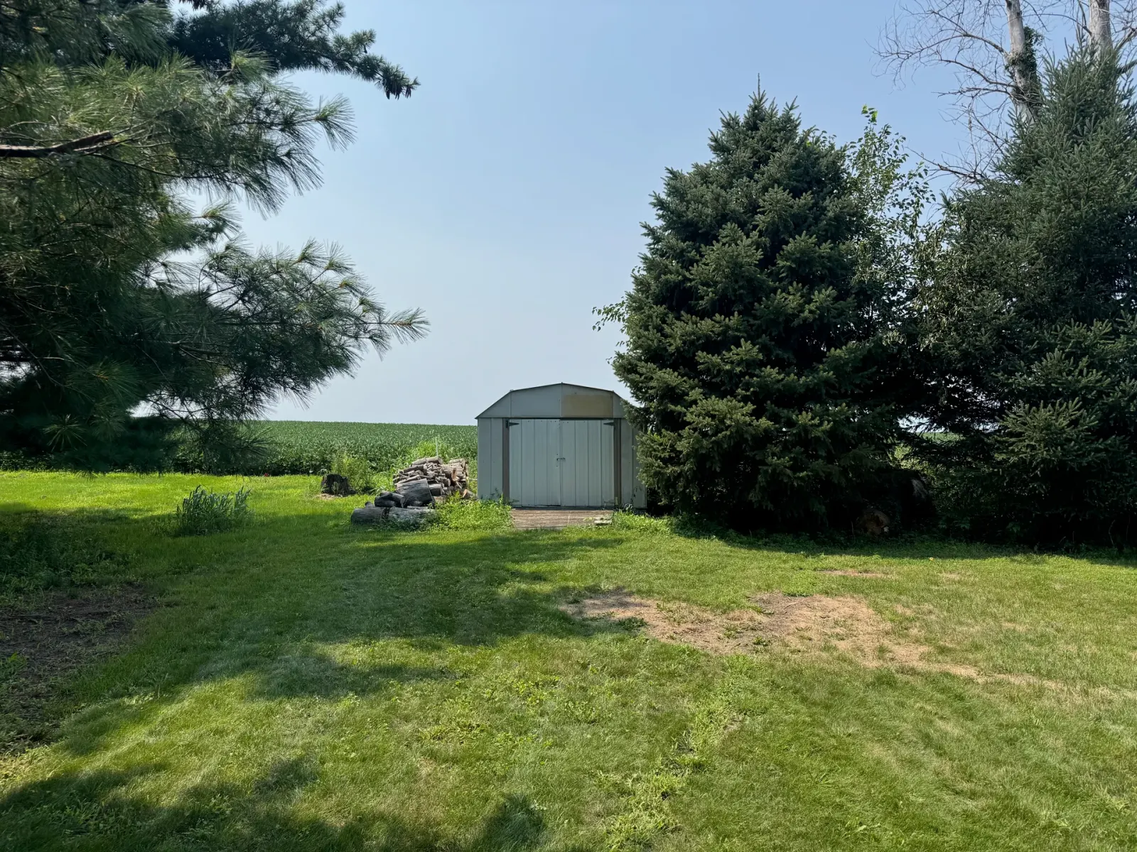 10908 NW 107th Street, Granger, Iowa - Storage Shed And Cornfield